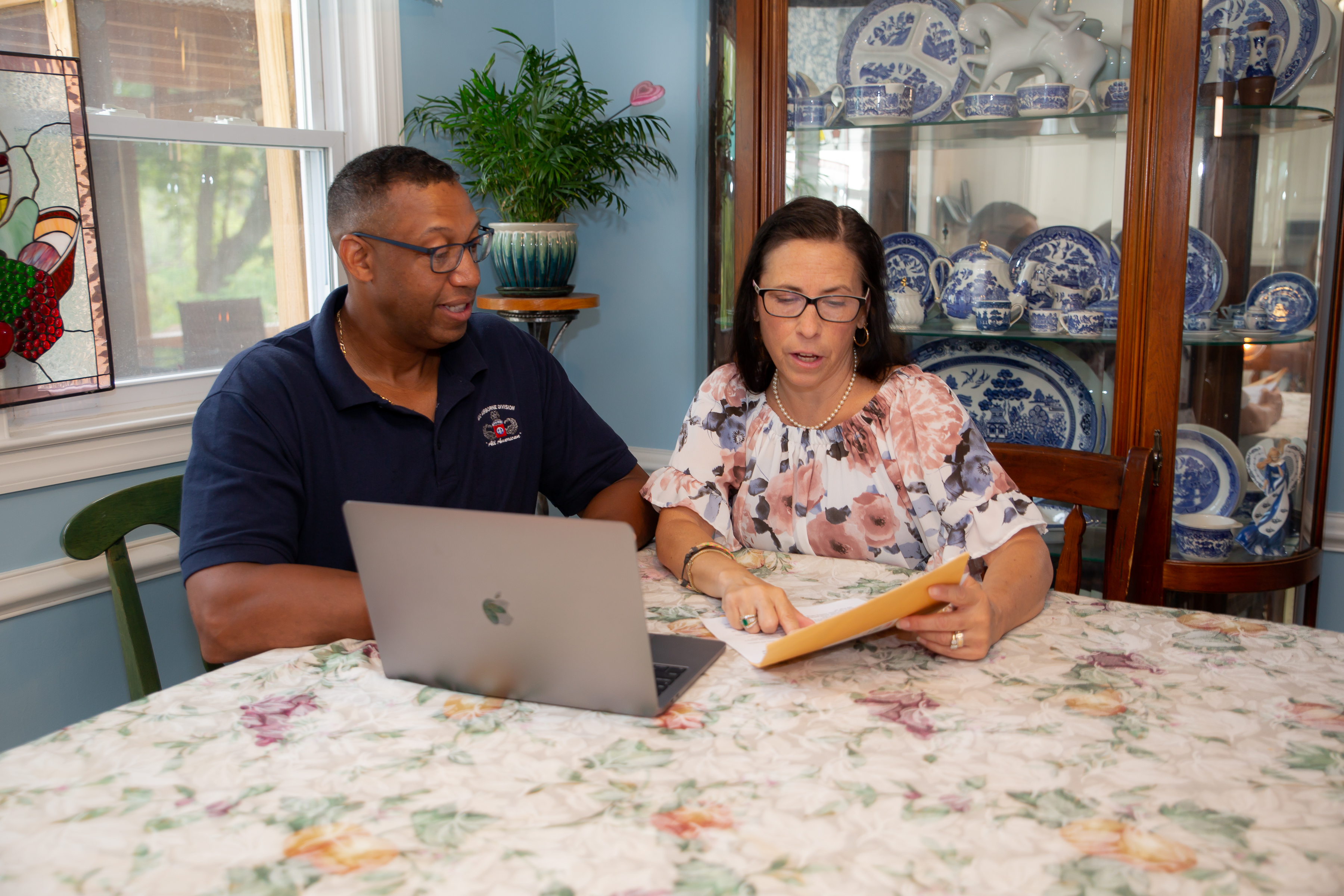 Family members discussing documents